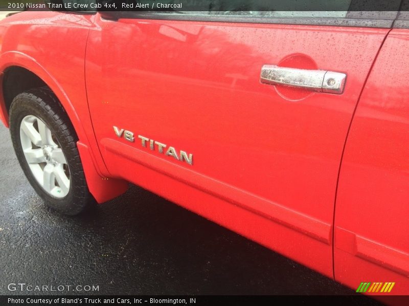 Red Alert / Charcoal 2010 Nissan Titan LE Crew Cab 4x4