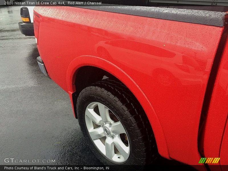 Red Alert / Charcoal 2010 Nissan Titan LE Crew Cab 4x4