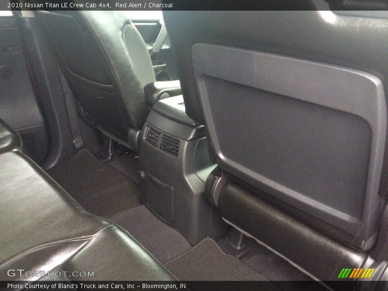 Red Alert / Charcoal 2010 Nissan Titan LE Crew Cab 4x4