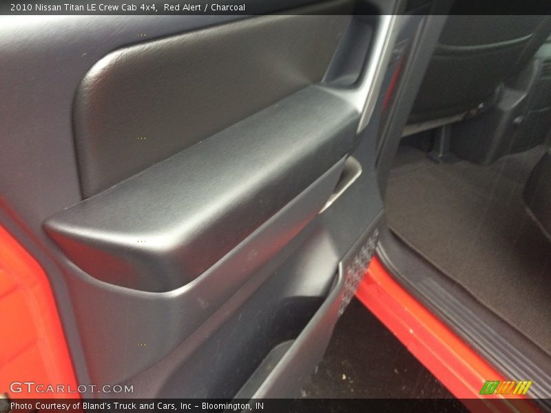 Red Alert / Charcoal 2010 Nissan Titan LE Crew Cab 4x4