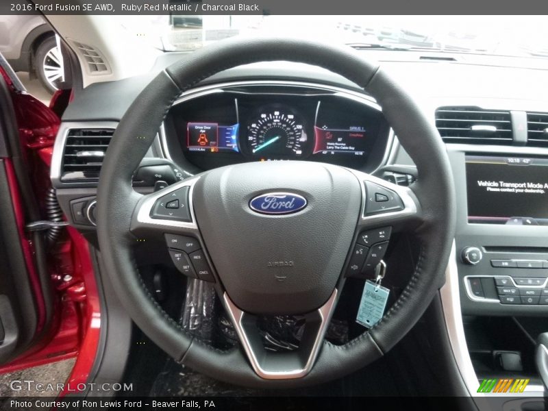 Ruby Red Metallic / Charcoal Black 2016 Ford Fusion SE AWD