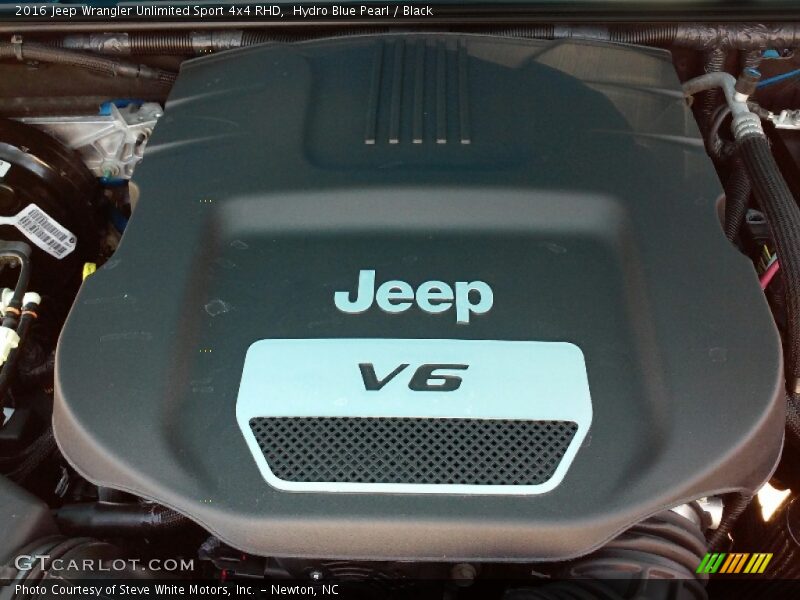 Hydro Blue Pearl / Black 2016 Jeep Wrangler Unlimited Sport 4x4 RHD