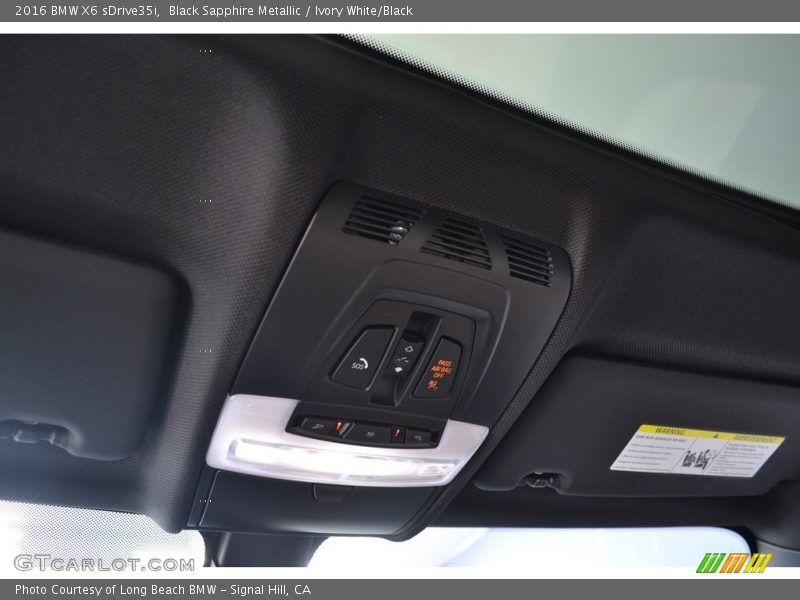 Black Sapphire Metallic / Ivory White/Black 2016 BMW X6 sDrive35i