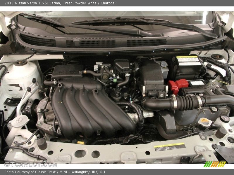 Fresh Powder White / Charcoal 2013 Nissan Versa 1.6 SL Sedan