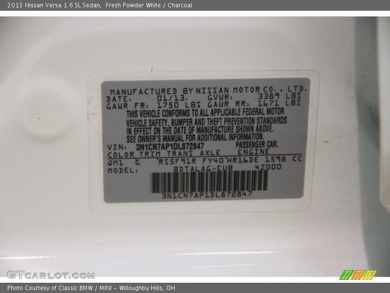 Fresh Powder White / Charcoal 2013 Nissan Versa 1.6 SL Sedan