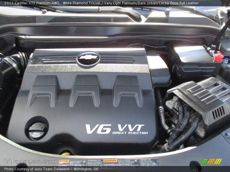 White Diamond Tricoat / Very Light Platinum/Dark Urban/Cocoa Opus Full Leather 2013 Cadillac XTS Platinum AWD