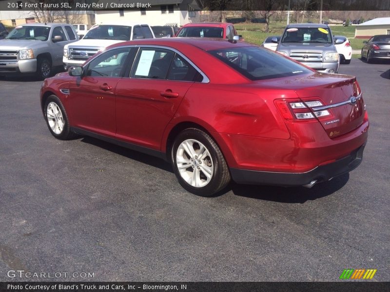 Ruby Red / Charcoal Black 2014 Ford Taurus SEL