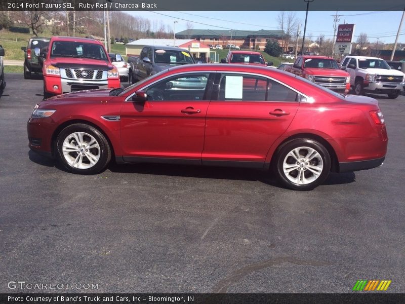 Ruby Red / Charcoal Black 2014 Ford Taurus SEL