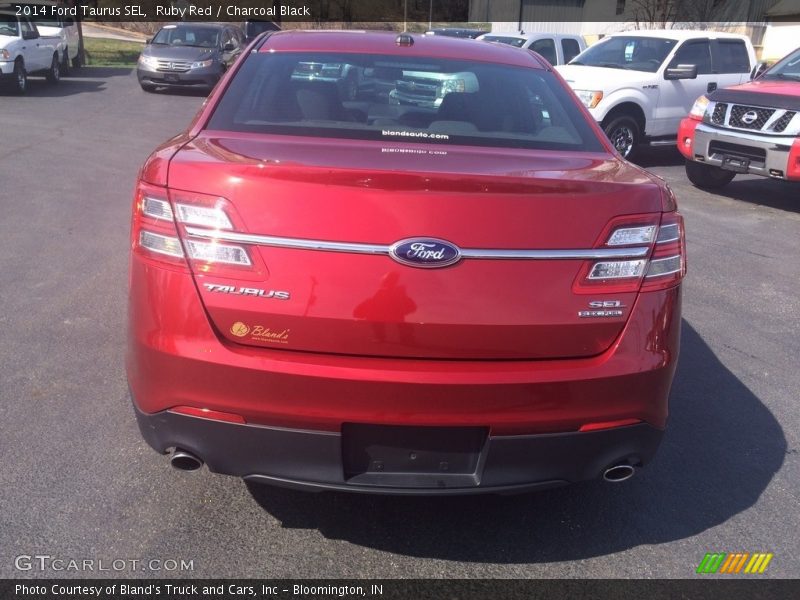 Ruby Red / Charcoal Black 2014 Ford Taurus SEL