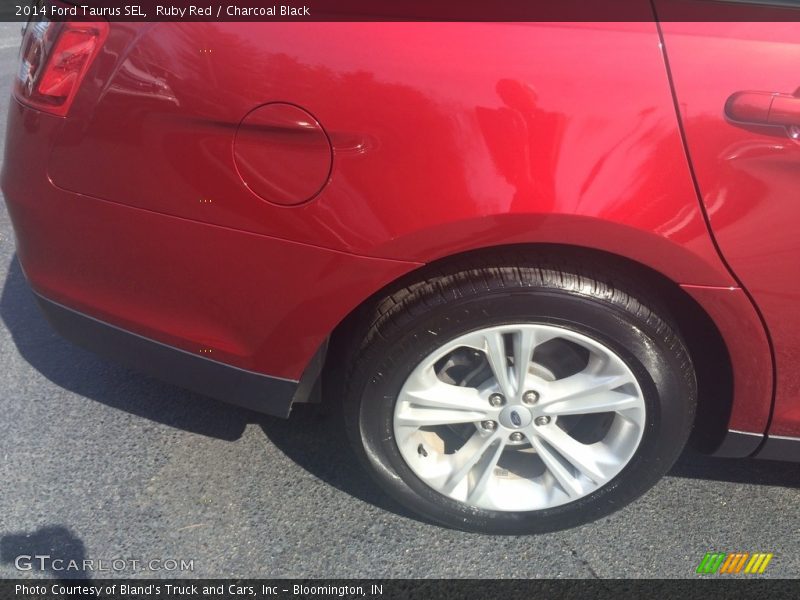 Ruby Red / Charcoal Black 2014 Ford Taurus SEL