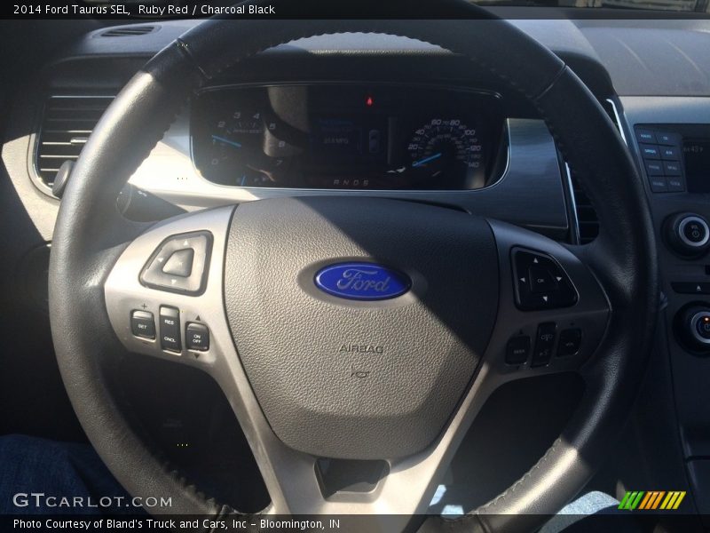 Ruby Red / Charcoal Black 2014 Ford Taurus SEL