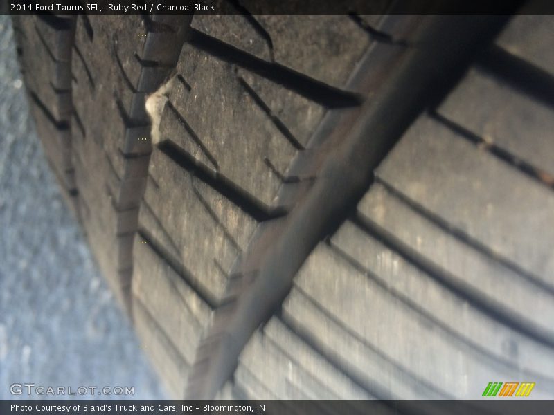 Ruby Red / Charcoal Black 2014 Ford Taurus SEL