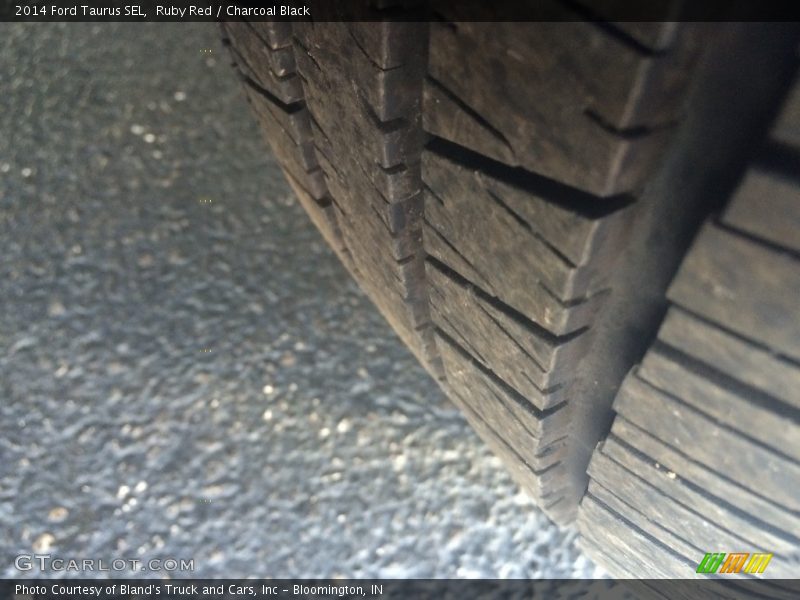 Ruby Red / Charcoal Black 2014 Ford Taurus SEL