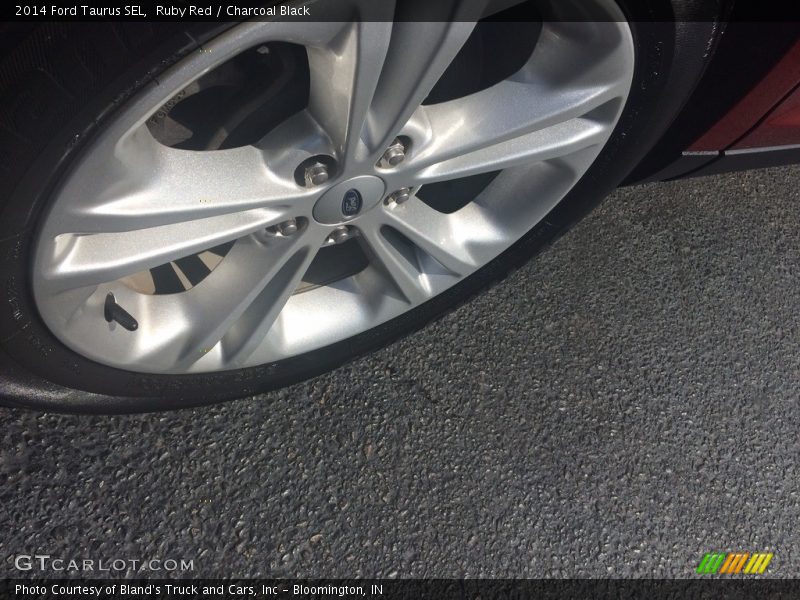 Ruby Red / Charcoal Black 2014 Ford Taurus SEL