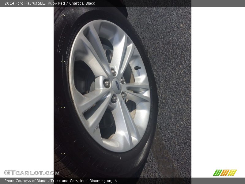 Ruby Red / Charcoal Black 2014 Ford Taurus SEL