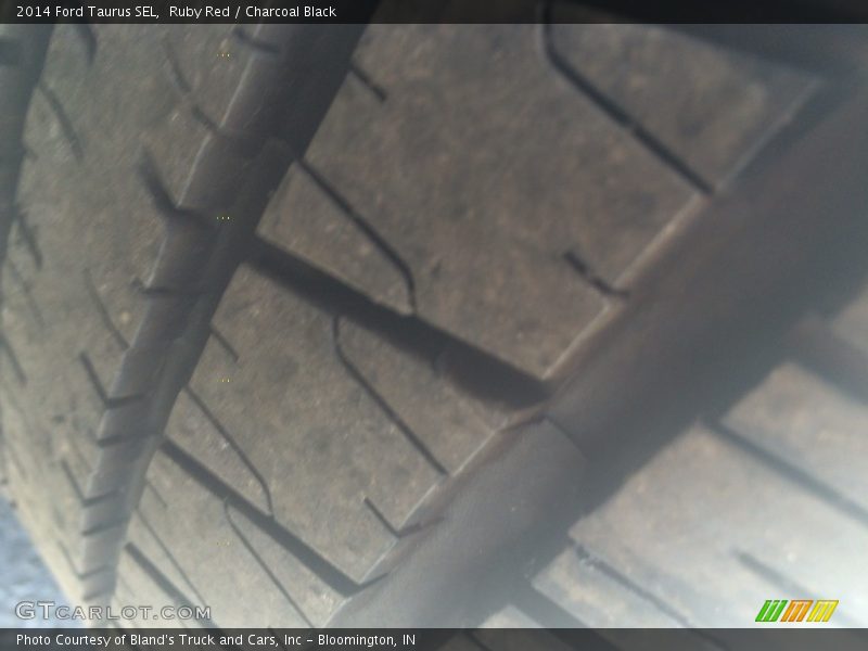 Ruby Red / Charcoal Black 2014 Ford Taurus SEL