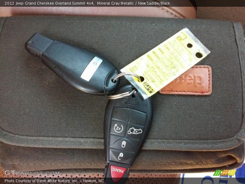Mineral Gray Metallic / New Saddle/Black 2012 Jeep Grand Cherokee Overland Summit 4x4