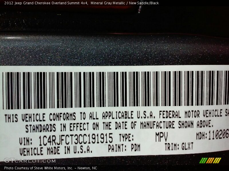 Mineral Gray Metallic / New Saddle/Black 2012 Jeep Grand Cherokee Overland Summit 4x4