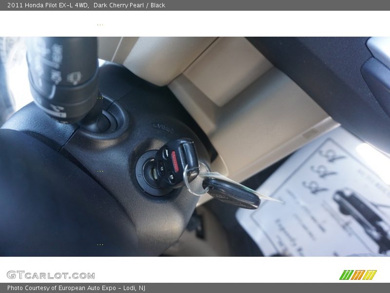 Dark Cherry Pearl / Black 2011 Honda Pilot EX-L 4WD