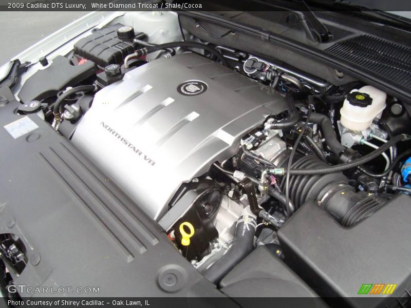 White Diamond Tricoat / Shale/Cocoa 2009 Cadillac DTS Luxury