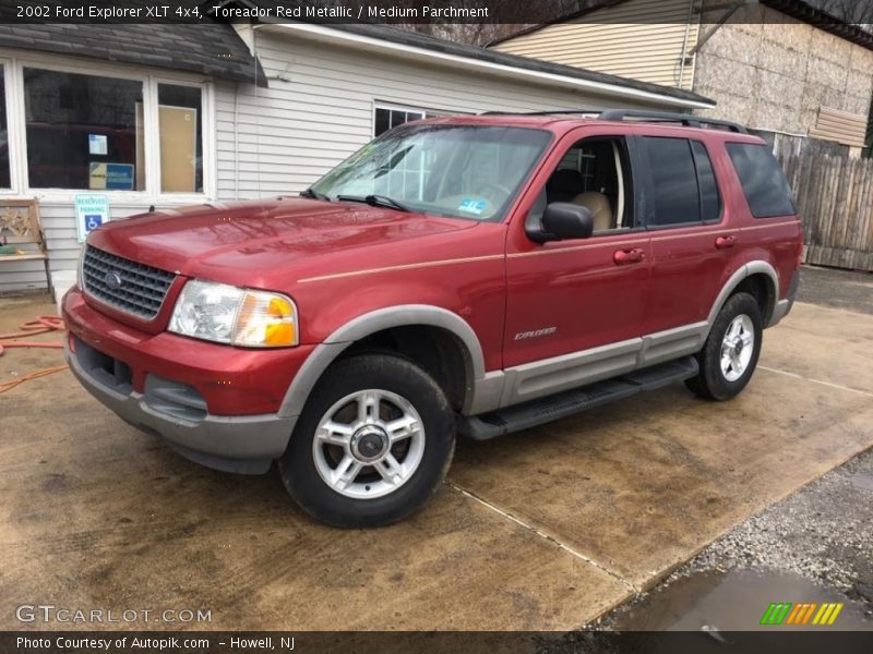 Toreador Red Metallic / Medium Parchment 2002 Ford Explorer XLT 4x4