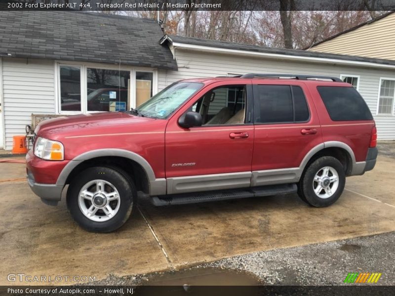 Toreador Red Metallic / Medium Parchment 2002 Ford Explorer XLT 4x4