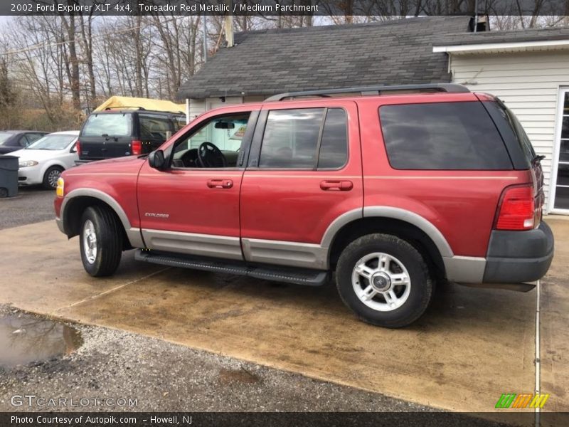 Toreador Red Metallic / Medium Parchment 2002 Ford Explorer XLT 4x4