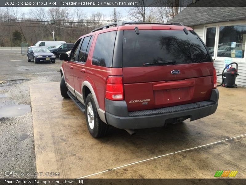 Toreador Red Metallic / Medium Parchment 2002 Ford Explorer XLT 4x4