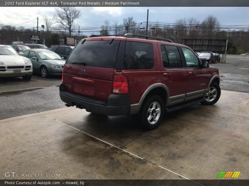 Toreador Red Metallic / Medium Parchment 2002 Ford Explorer XLT 4x4