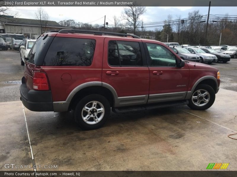Toreador Red Metallic / Medium Parchment 2002 Ford Explorer XLT 4x4