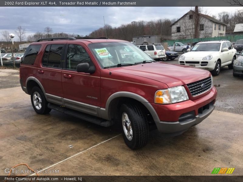 Toreador Red Metallic / Medium Parchment 2002 Ford Explorer XLT 4x4