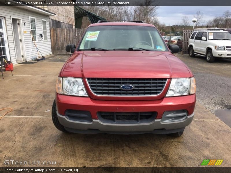 Toreador Red Metallic / Medium Parchment 2002 Ford Explorer XLT 4x4