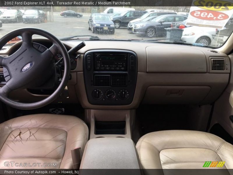 Toreador Red Metallic / Medium Parchment 2002 Ford Explorer XLT 4x4