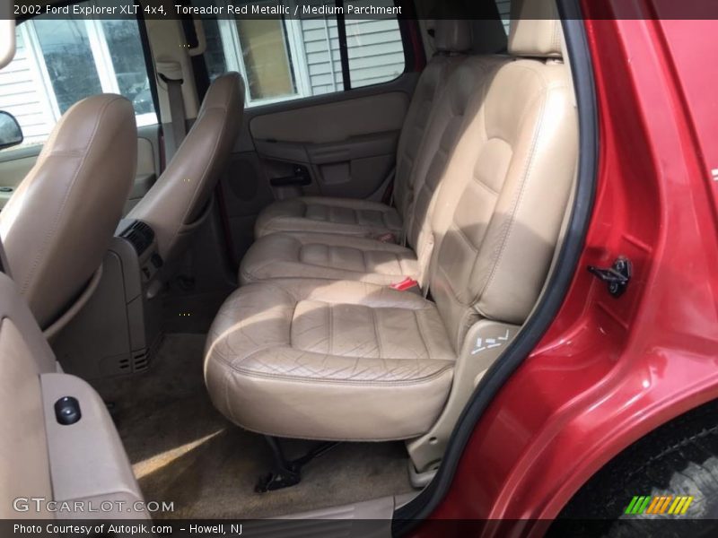 Toreador Red Metallic / Medium Parchment 2002 Ford Explorer XLT 4x4