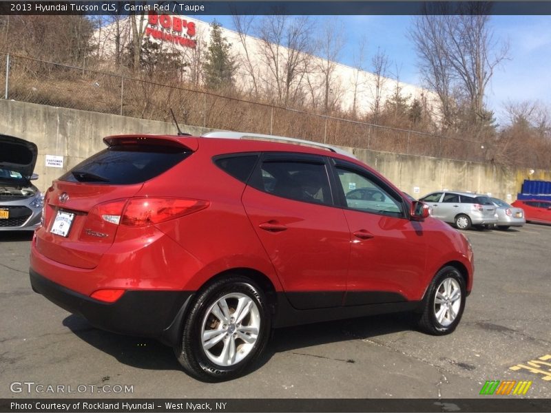 Garnet Red / Taupe 2013 Hyundai Tucson GLS