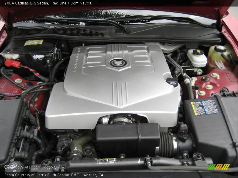 Red Line / Light Neutral 2004 Cadillac CTS Sedan