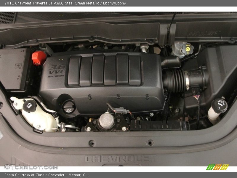 Steel Green Metallic / Ebony/Ebony 2011 Chevrolet Traverse LT AWD