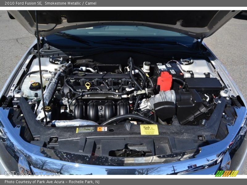 Smokestone Metallic / Camel 2010 Ford Fusion SE