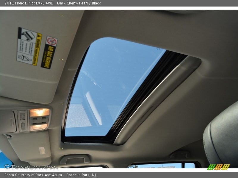 Dark Cherry Pearl / Black 2011 Honda Pilot EX-L 4WD