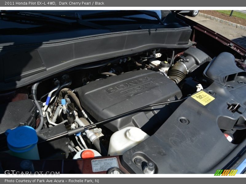 Dark Cherry Pearl / Black 2011 Honda Pilot EX-L 4WD