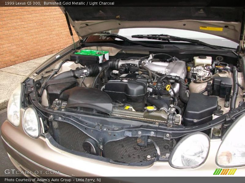 Burnished Gold Metallic / Light Charcoal 1999 Lexus GS 300
