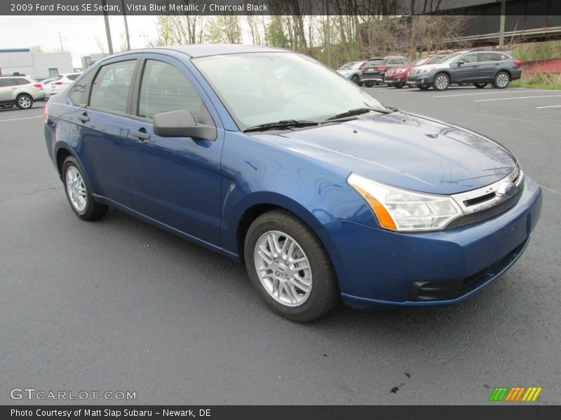 Vista Blue Metallic / Charcoal Black 2009 Ford Focus SE Sedan