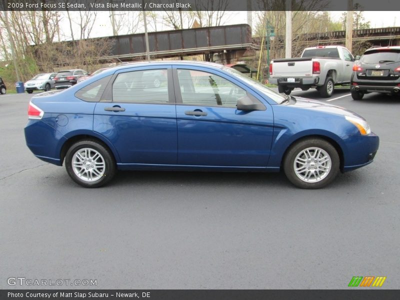 Vista Blue Metallic / Charcoal Black 2009 Ford Focus SE Sedan