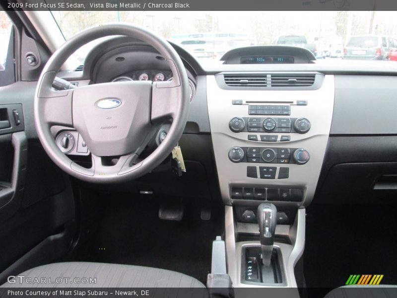 Vista Blue Metallic / Charcoal Black 2009 Ford Focus SE Sedan