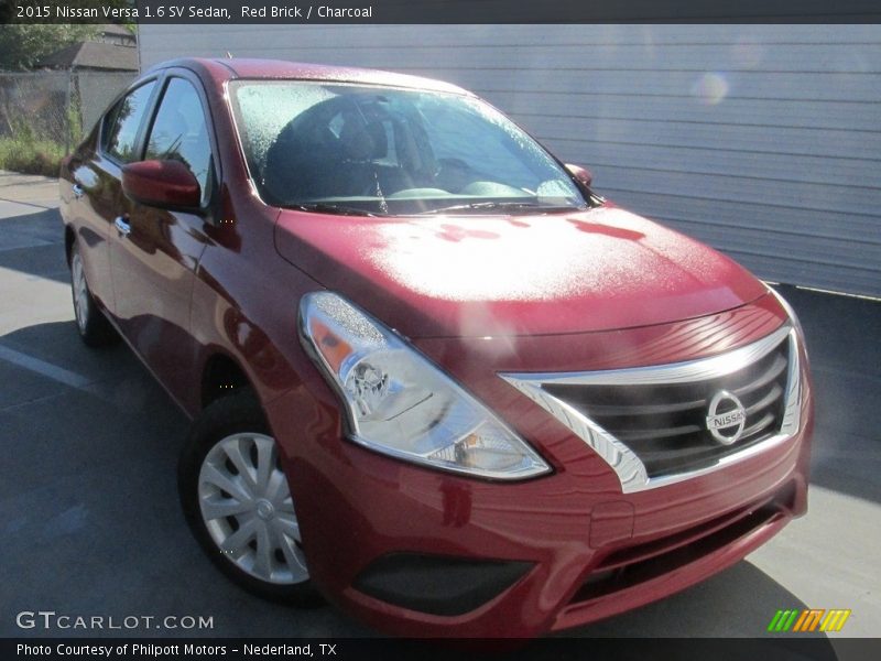 Red Brick / Charcoal 2015 Nissan Versa 1.6 SV Sedan
