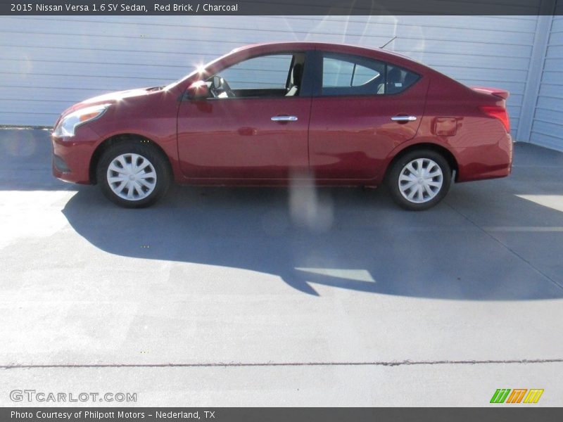Red Brick / Charcoal 2015 Nissan Versa 1.6 SV Sedan