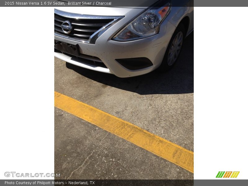 Brilliant Silver / Charcoal 2015 Nissan Versa 1.6 SV Sedan