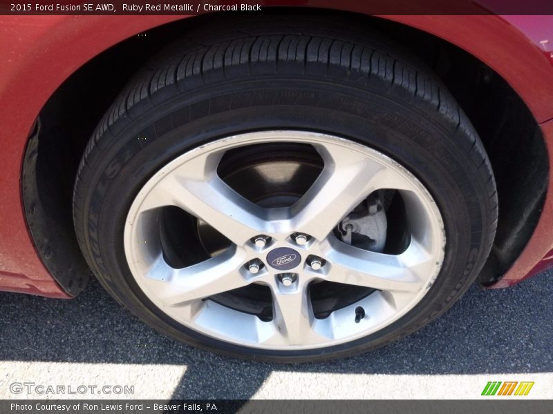 Ruby Red Metallic / Charcoal Black 2015 Ford Fusion SE AWD
