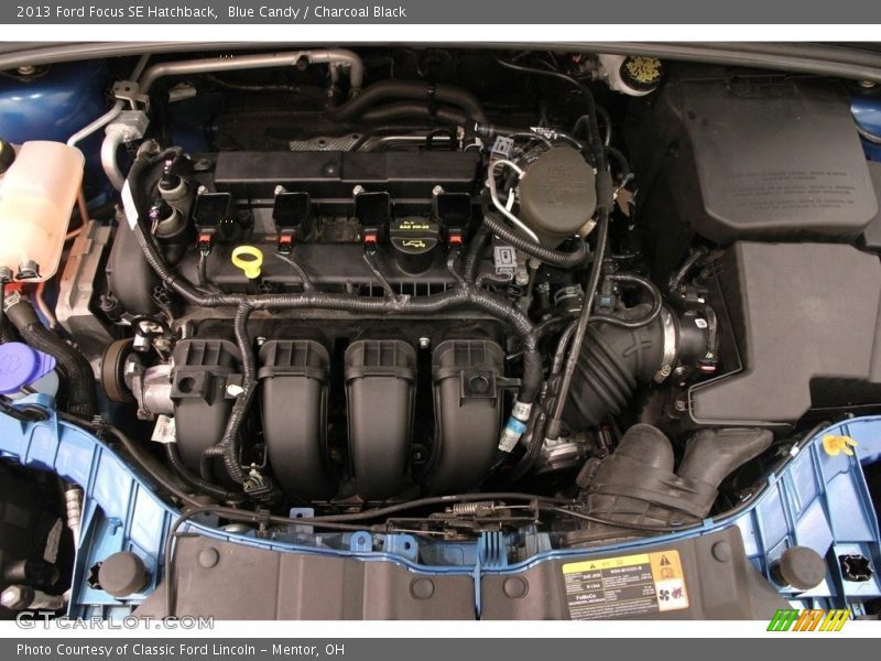 Blue Candy / Charcoal Black 2013 Ford Focus SE Hatchback