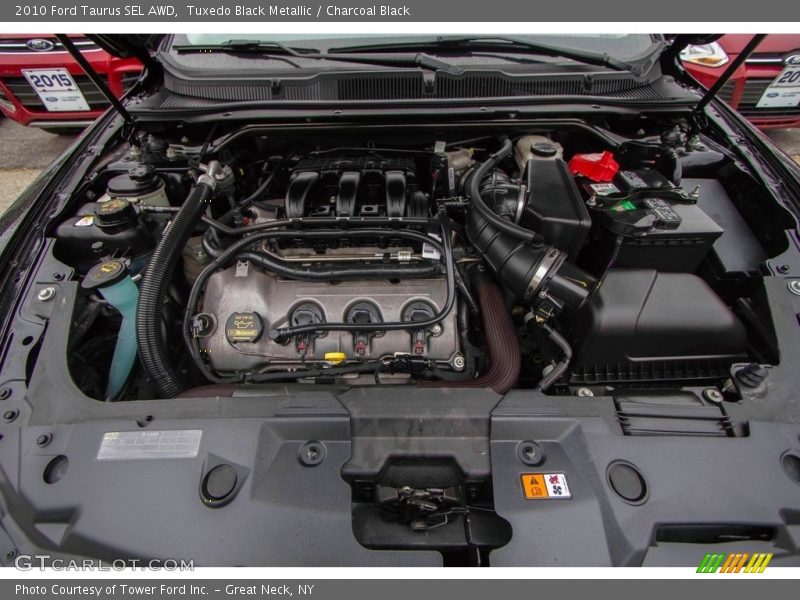Tuxedo Black Metallic / Charcoal Black 2010 Ford Taurus SEL AWD